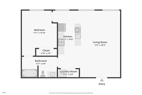 A floor plan of a small apartment with a living room, kitchen, bathroom, bedroom, closet, and laundry room.